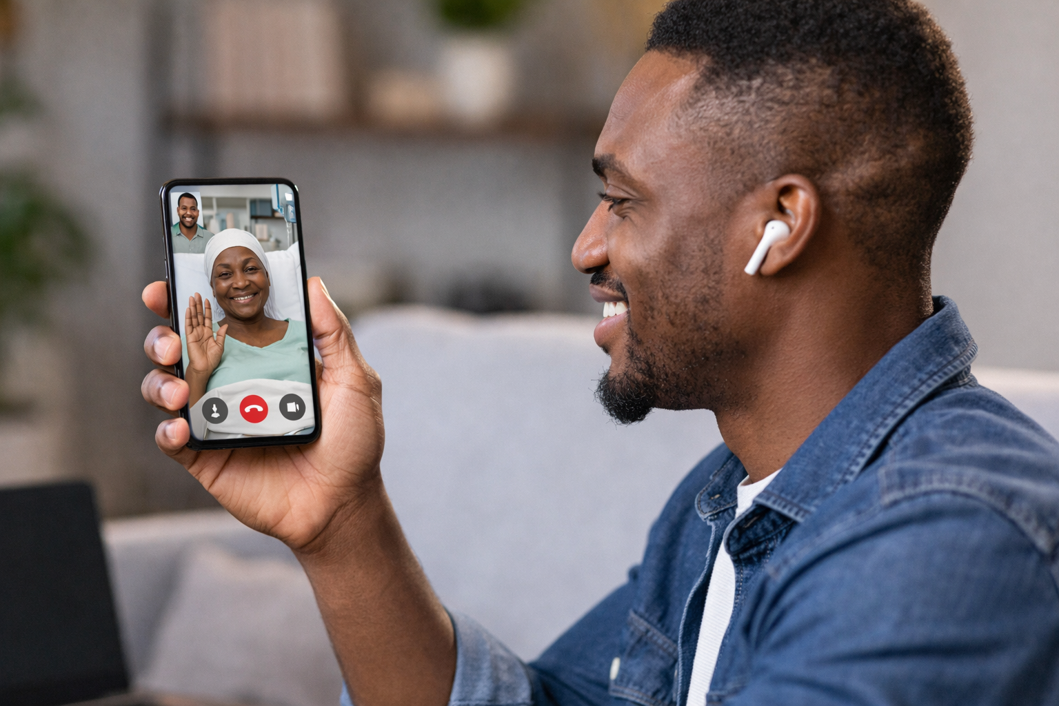 Son video-calling mother in hospital - Ensuram healthcare payments for Nigerians in Nigeria and abroad